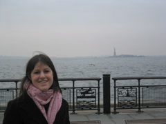 Catherine with the Statue of Liberty in the distance
