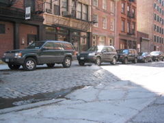 Steam rising from a New York manhole cover