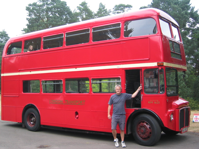 Larry beside the soon to be re-fitted red bus