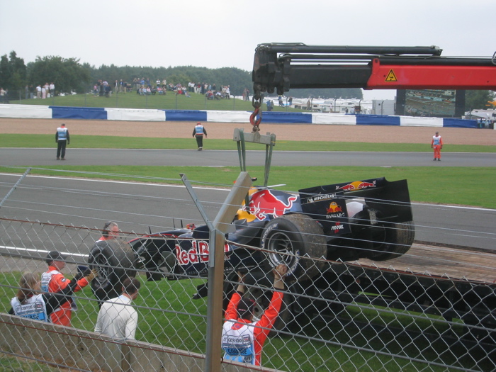 Great care as the Red Bull is lifted onto the back of the truck
