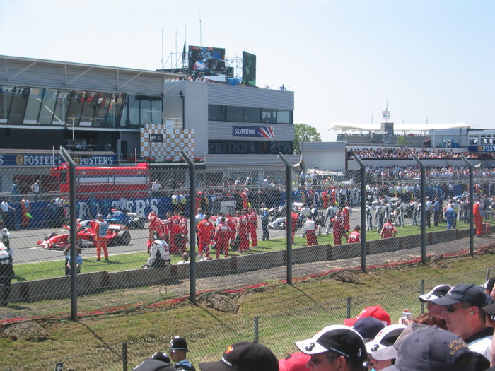 F1 cars make their way to their grid positions
