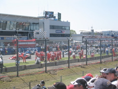 F1 cars make their way to their grid positions