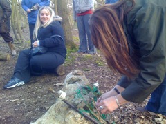 Mandy can't resist completing the nature weaving!